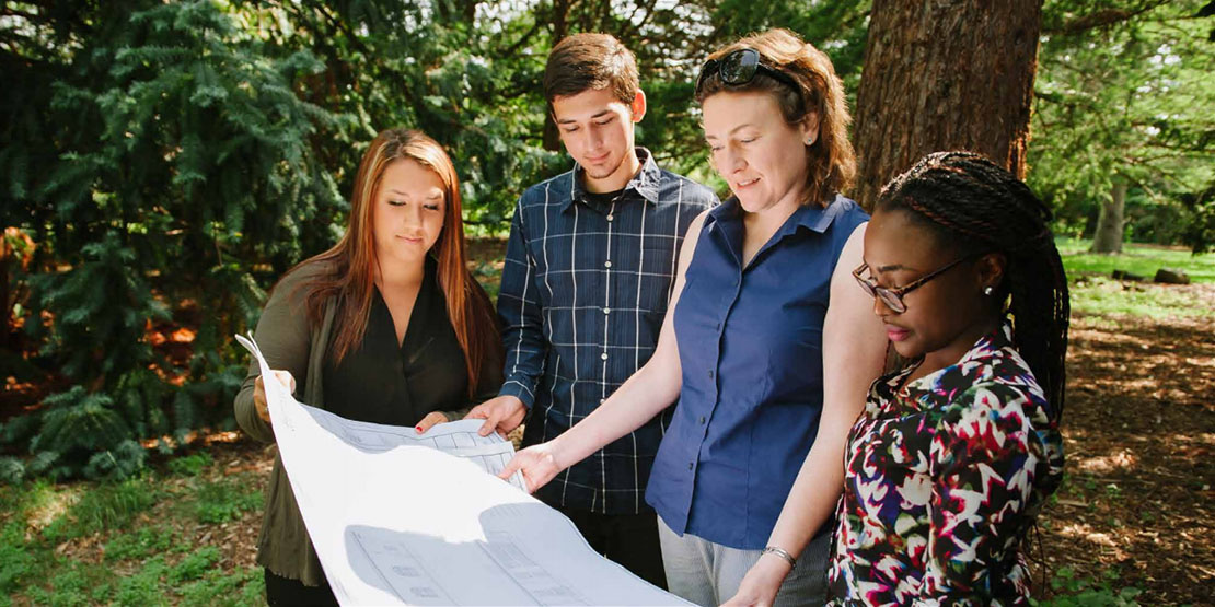 Orla LoPiccolo with three students