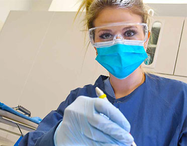 An FSC Dental Hygiene student