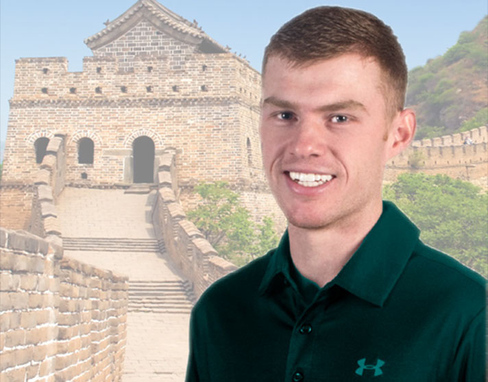 Jamie Jones in foreground, Great Wall of China in background