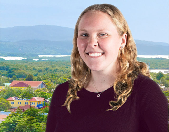 Kaitlyn Kallansrude in foreground, Jamaica in background