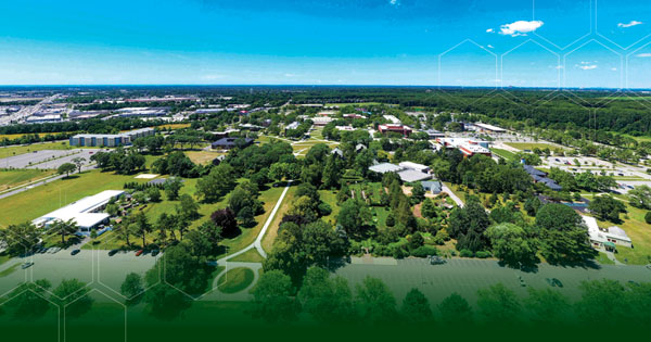 Aerial photo of campus with decorative hex pattern overlay